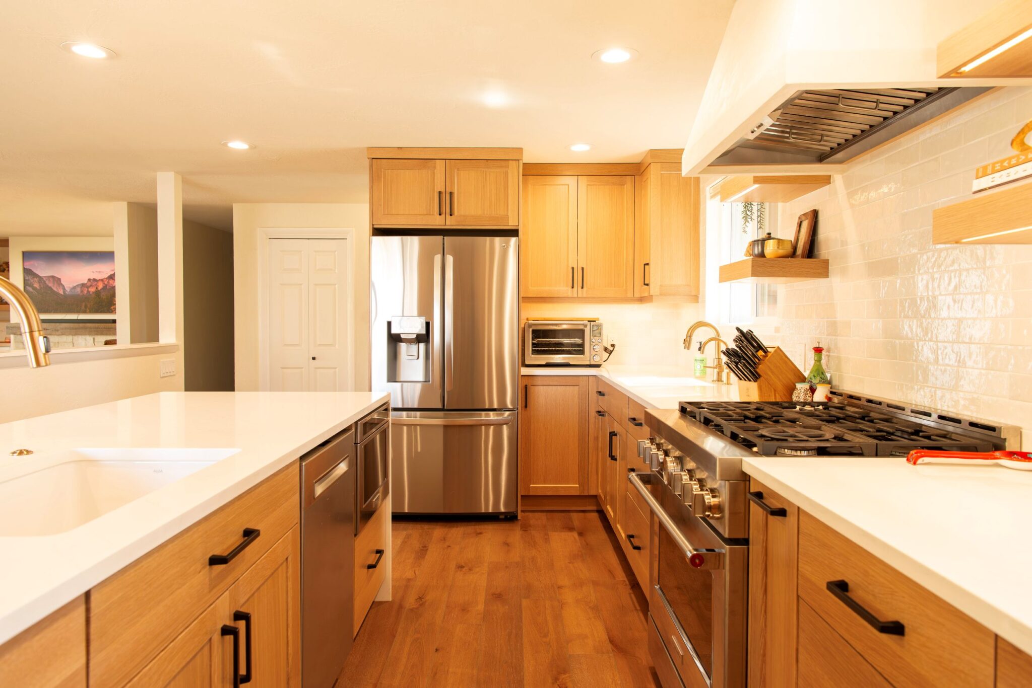 A newly remodeled kitchen featuring modern cabinetry, updated countertops, stainless‑steel appliances, and bright, even lighting. The space looks clean, open, and contemporary.